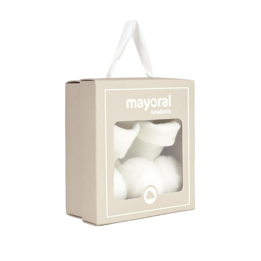 Mayoral Newborn Headpiece And Socks Set Natural in beige box, white fluffy socks visible through the window.