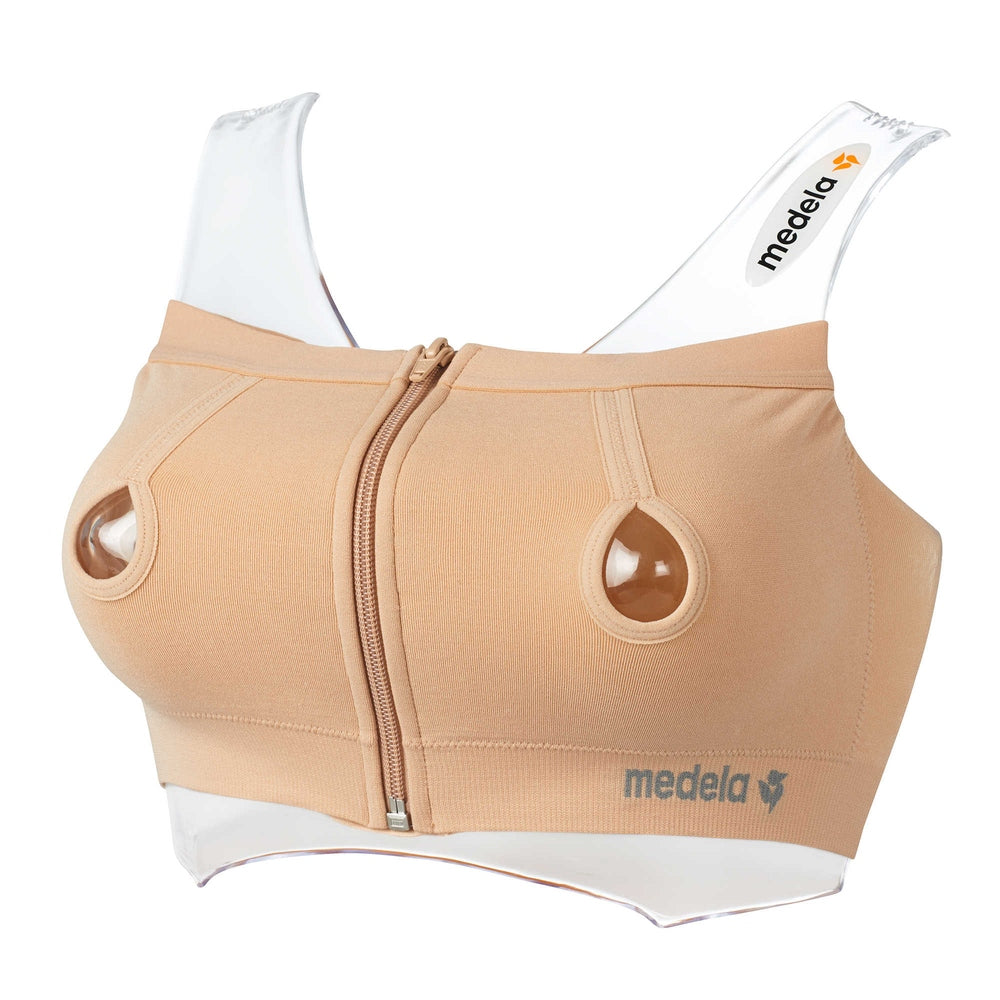 Medela Easy Expression Bustier Nude: beige nursing bustier with front zipper and accessible nipple openings.