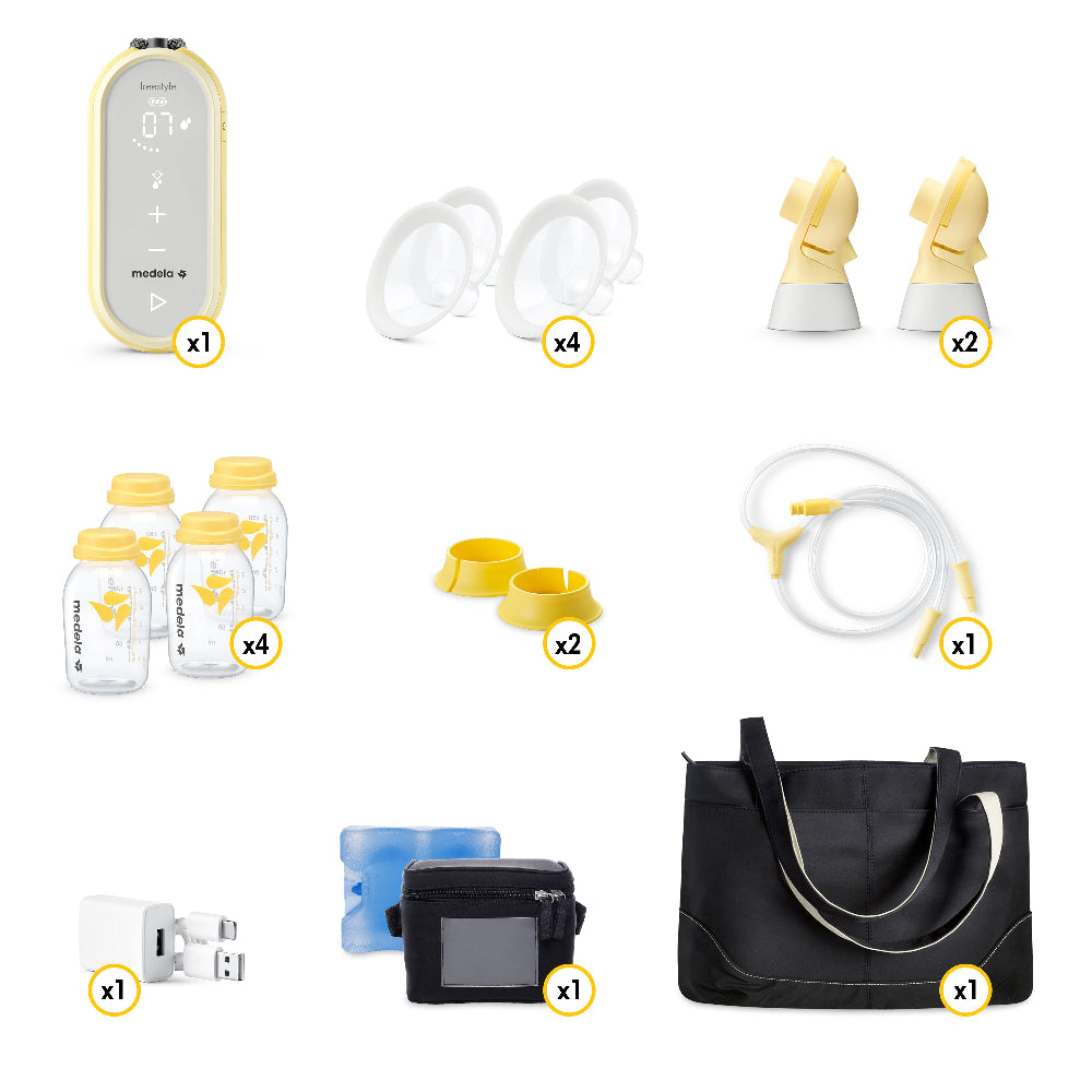 Medela Freestyle Flex breastpump double electric with 4 bottles, 4 shields, 2 pump cups, tubing, charger and black tote bag