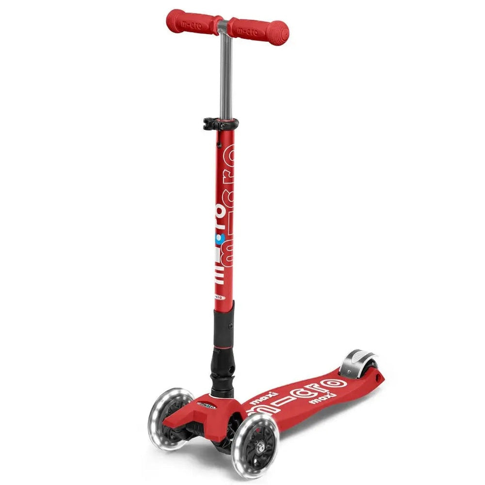 Micro Maxi Foldable Deluxe LED Scooter, red three-wheel design with sturdy stem and deck for riding.