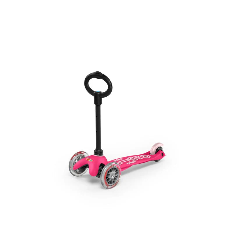 Micro Mini 3In1 Deluxe Scooter Pink with adjustable black T-bar and three wheels.