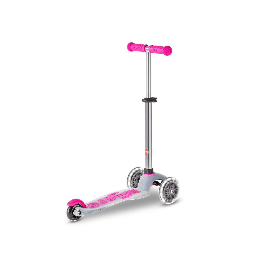 Micro Mini Deluxe Flux LED Scooter; pink handlebar grips and wheel accents, silver deck, MICRO brand