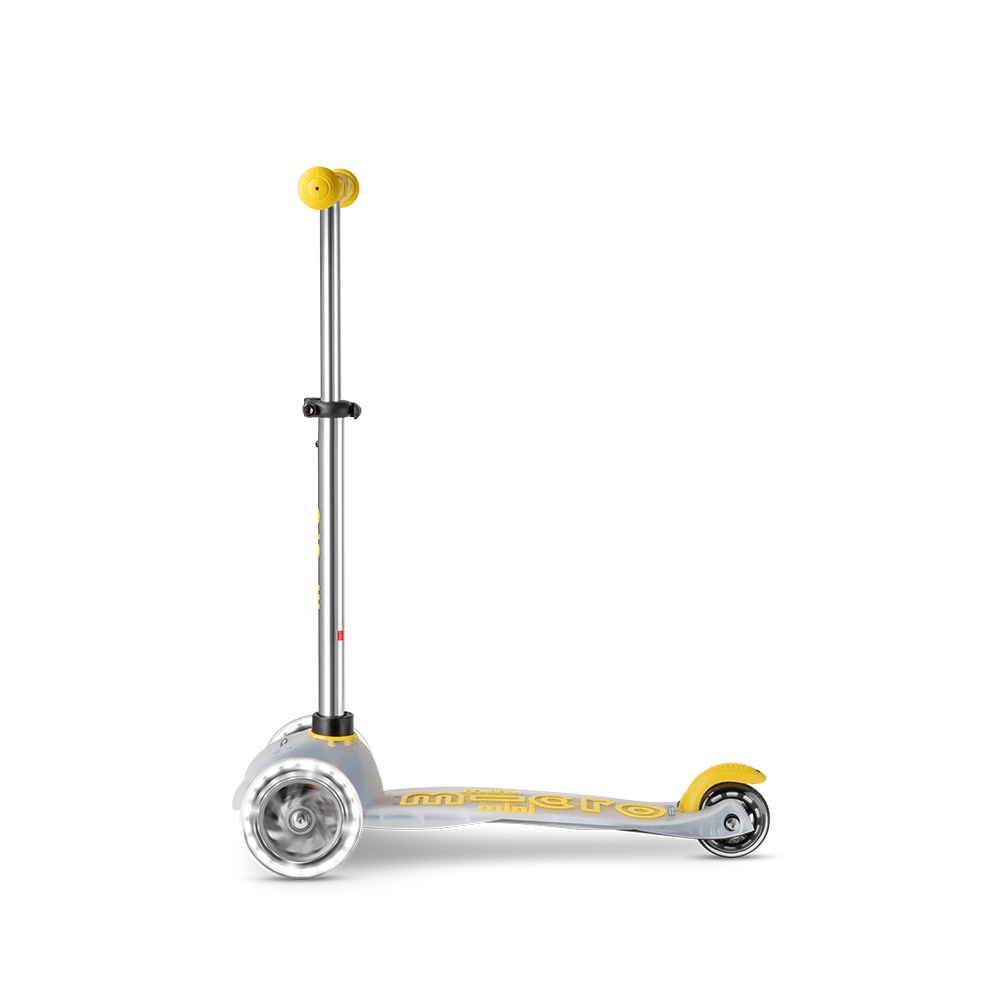 Micro Mini Deluxe Flux LED scooter by MICRO, silver frame with yellow wheels