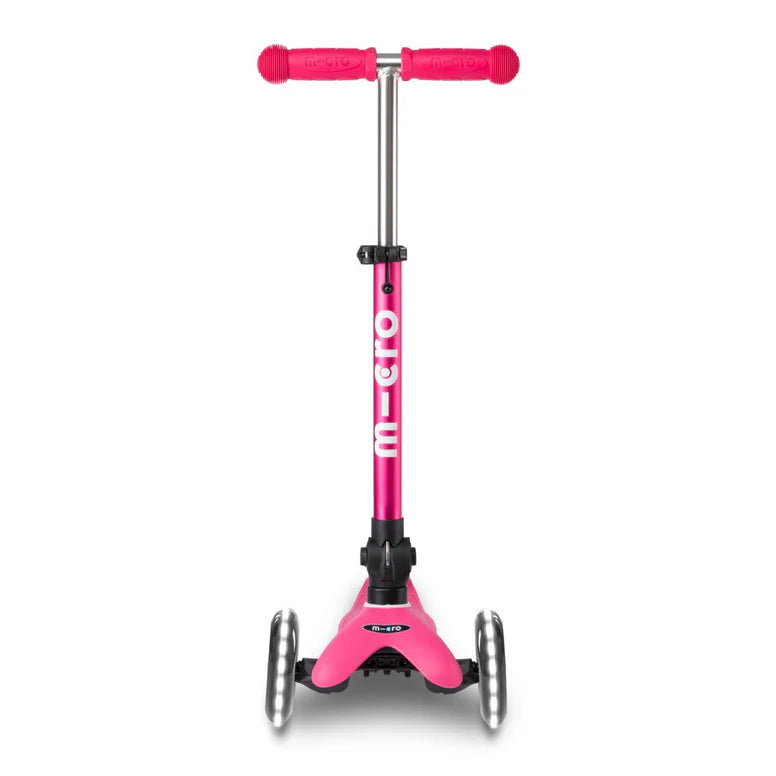 Micro Mini Deluxe Foldable LED scooter in pink, three-wheel design with foldable stem and LED wheels.