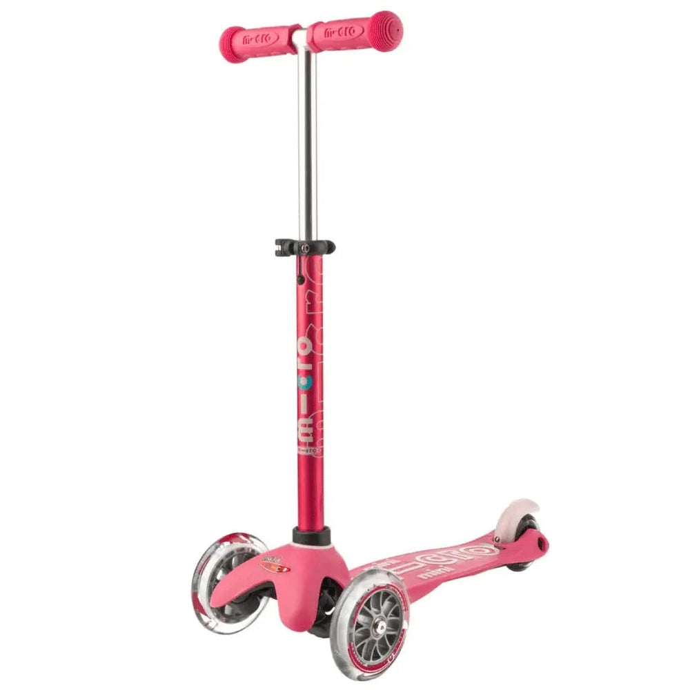 Micro Mini Deluxe Scooter, pink three-wheel kids scooter with adjustable handlebar and large front wheels ready to ride