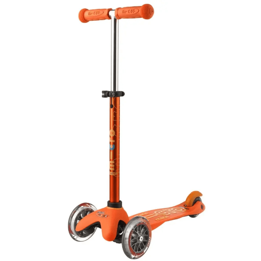 Micro Mini Deluxe Scooter in orange with three wheels and adjustable handlebars, ready for young riders