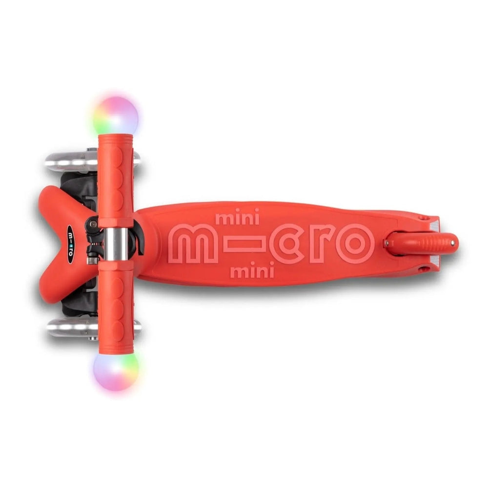 Micro Mini2Grow Deluxe LED Scooter, red deck and rainbow LED wheels.