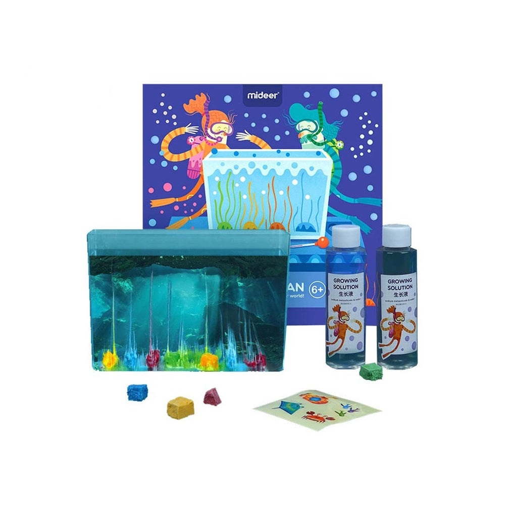 MIDEER Fantasy Ocean science kit with blue aquarium pouch, two growing-solution bottles, and colorful coral pieces