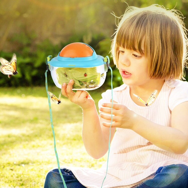 MIDEER Insect Box, blue lid with orange top and clear container, held by a child outdoors among butterflies