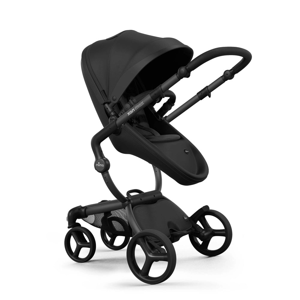 Mima Xari Max Stroller in black with extended canopy, reclined seat, and four-wheel chassis.