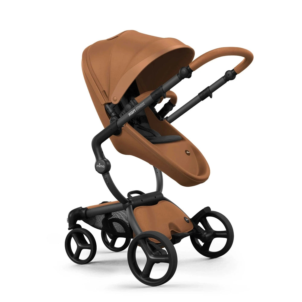 Mima Xari Max Stroller in tan brown with black frame; canopy extended and sturdy four-wheel base shown.