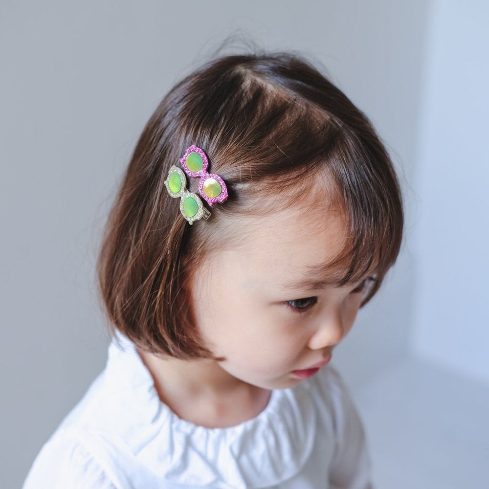 Mimi & Lula glittery glasses clips, butterfly design in green with pink glitter accents
