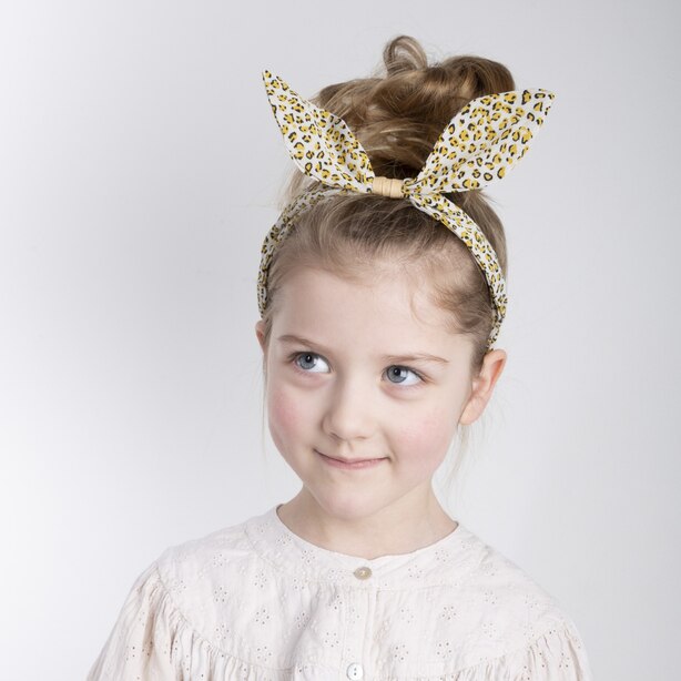 Mimi & Lula Jungle Coco Bow Alice Band leopard print headband on young girl
