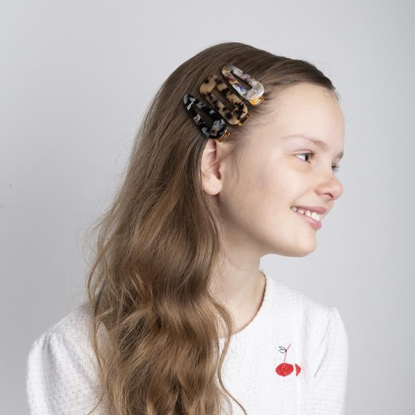 Mimi & Lula tortoise resin hair clips set of 3 in girl’s side profile with long wavy hair