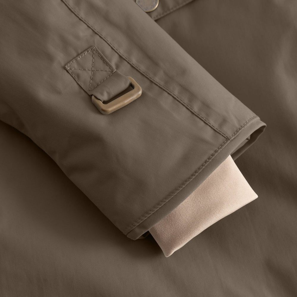 MINI A TURE fleece-lined toddler jacket in tarmac green with beige cuff.