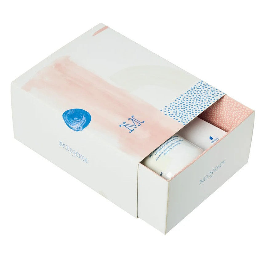 Minois Paris Essentials Gift Box with pastel pink and blue wrap containing skincare products