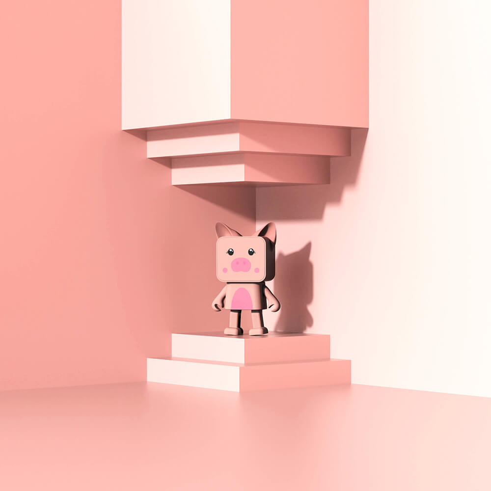 MOB Dancing Animals Pig Bluetooth speaker in pink cube toy style on pink pedestal