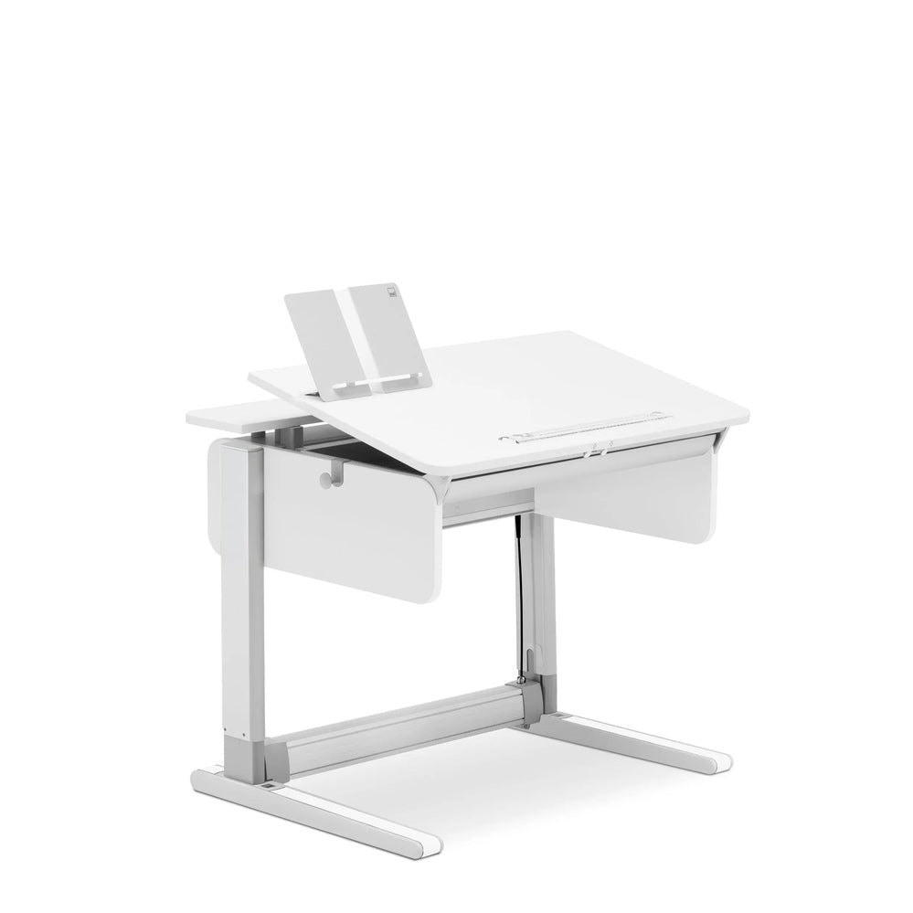 Moll Champion Compact Express height-adjustable desk in white with metal frame, showing a tilted desktop for ergonomic use.