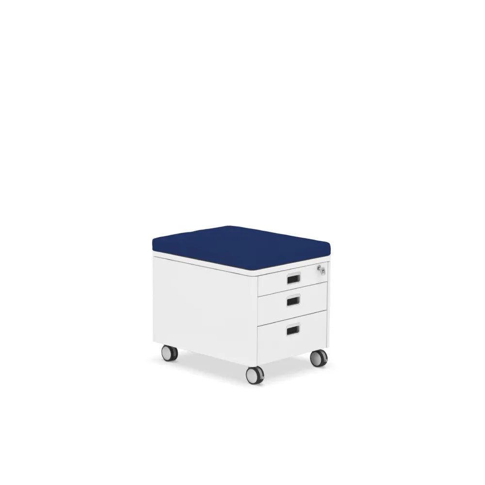 Moll Champion Cubic Pad white mobile storage cabinet with navy cushion; three drawers and wheels rolling.