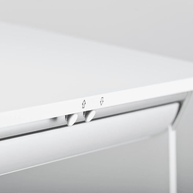 Moll Champion Height Adjustable Desk Front Up in white, showing up/down arrow controls and knobs for height adjustment.