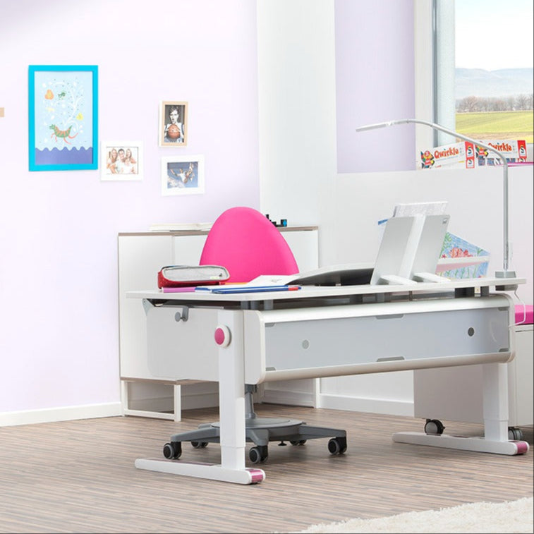 MOLL Champion Height Adjustable Desk Left Up in white with pink chair, showcased in a bright study room.