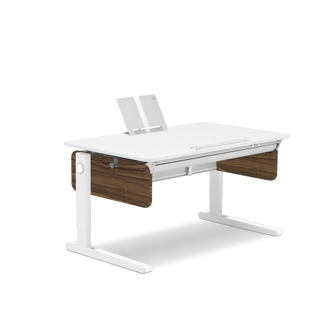 Moll Champion Height Adjustable Desk Right Up, white top with walnut panels and integrated monitor stand in use