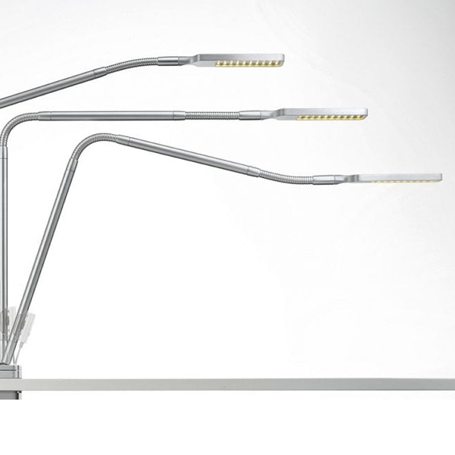 Moll FlexLight desk lamp with three adjustable gooseneck arms and slim LED heads in metallic finish