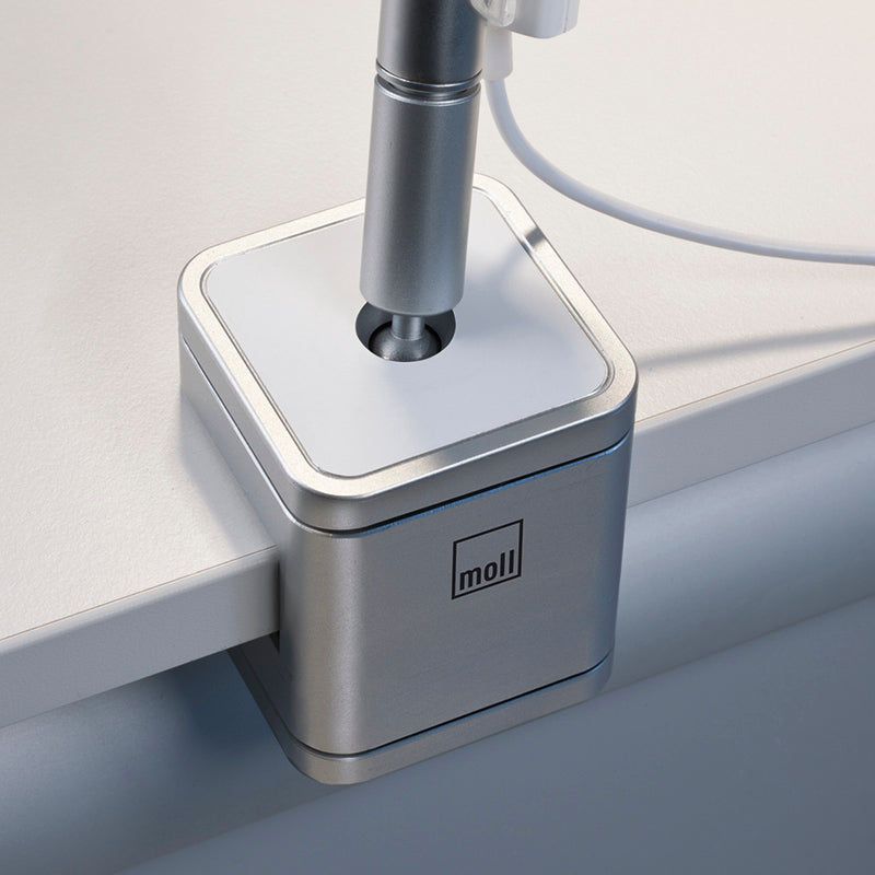 Moll FlexLight desk lamp with silver square base and adjustable arm