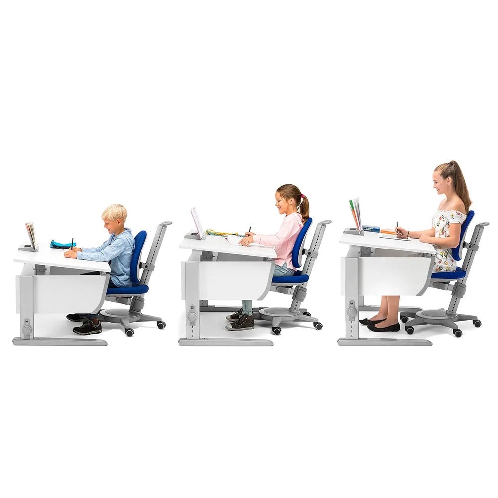 Moll Maximo Children Swivel Chair, white frame with blue seat, three kids study and write at desks.