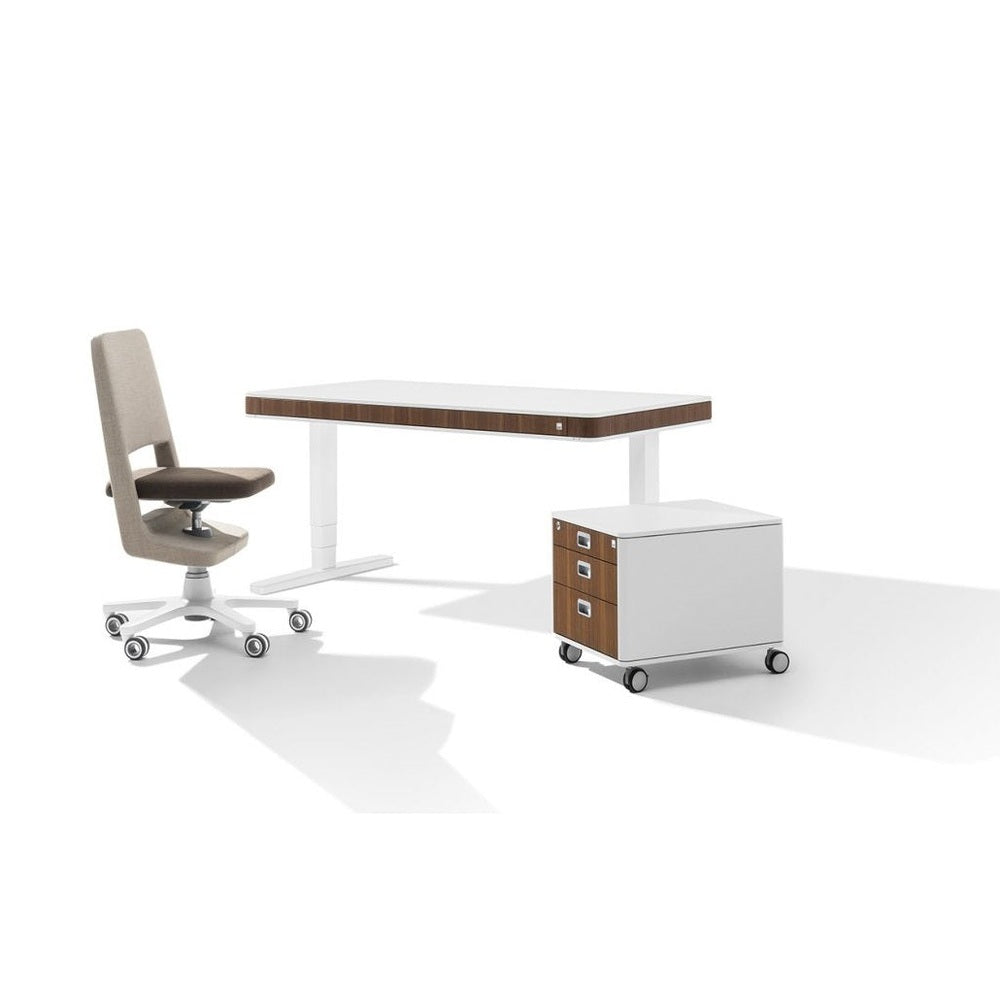 Moll S9 beige/dark brown office chair with white base beside a white desk and wood-drawer cabinet