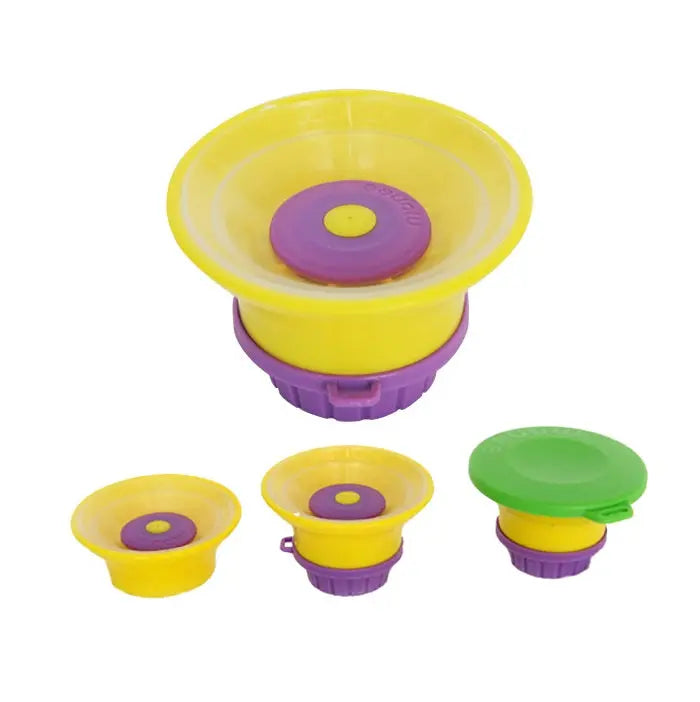 MONEE Cap feeding caps set in yellow with purple rims and a green lid; four pieces shown.