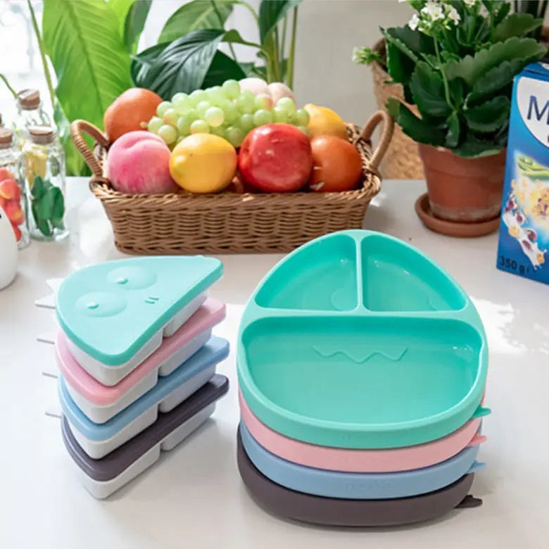 Monee Dinosaur Food Plate Combo: turquoise three-compartment plate with pastel stackable plates ready for toddler