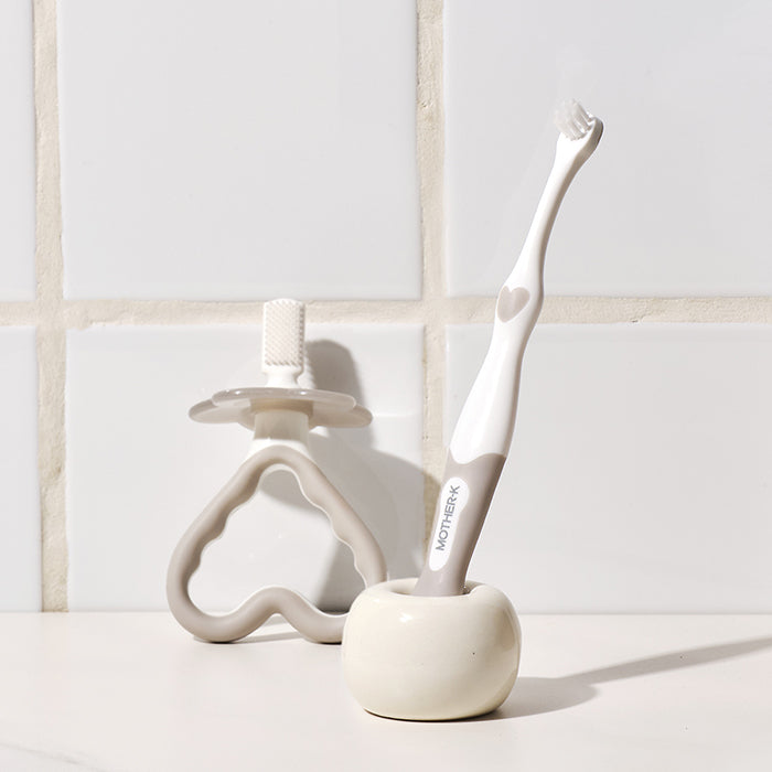 Mother-K baby toothbrushes 2-pack with grey-white handles and silicone stand