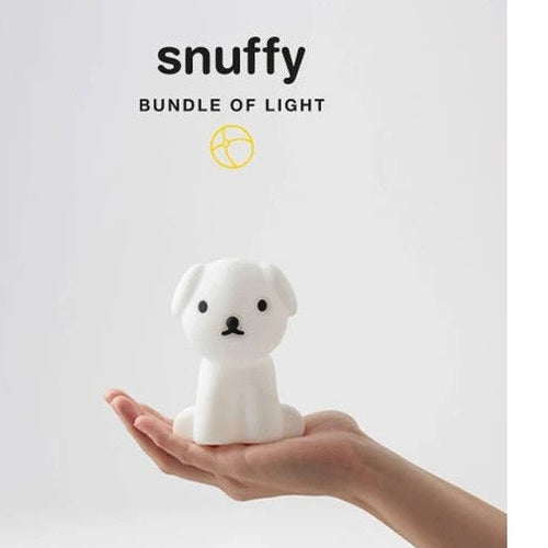 Mr Maria Snuffy Bundle of Light white dog night light held in hand