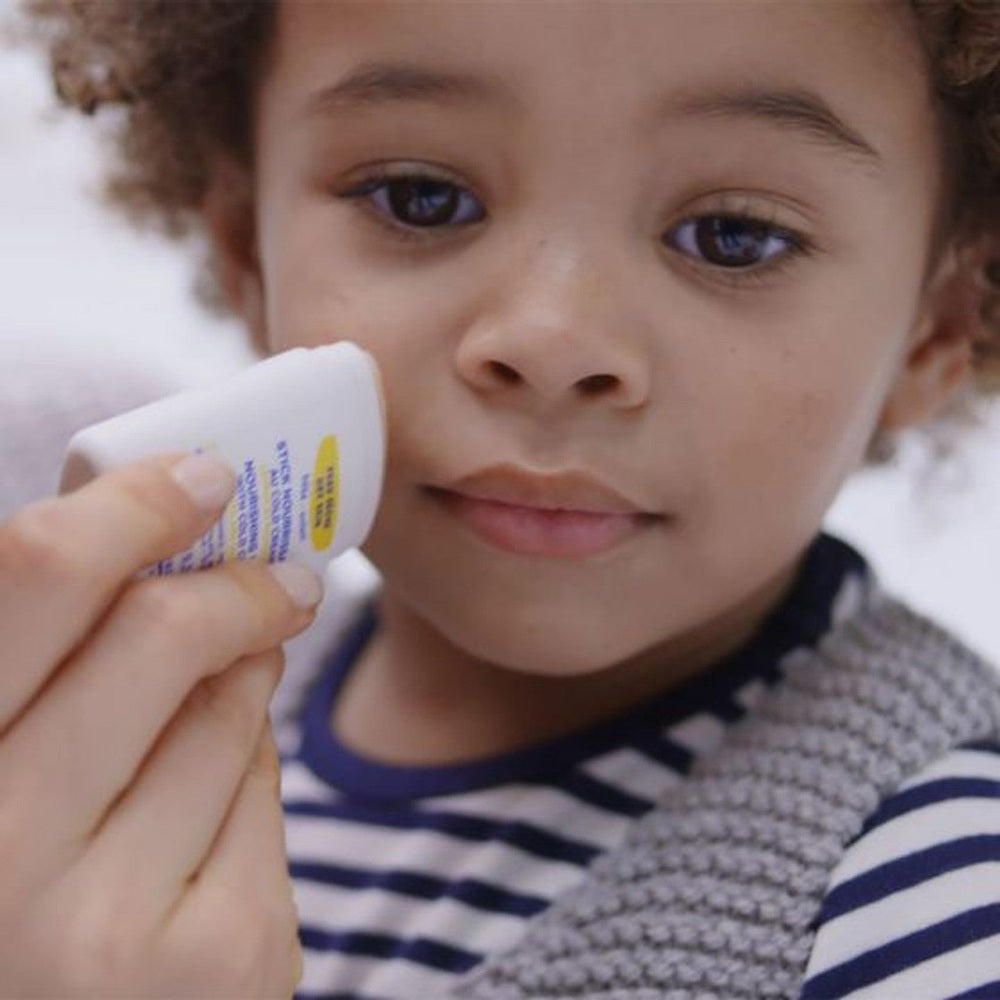 Mustela Nourishing Cold Cream Stick 9.2g applied to a young child’s face