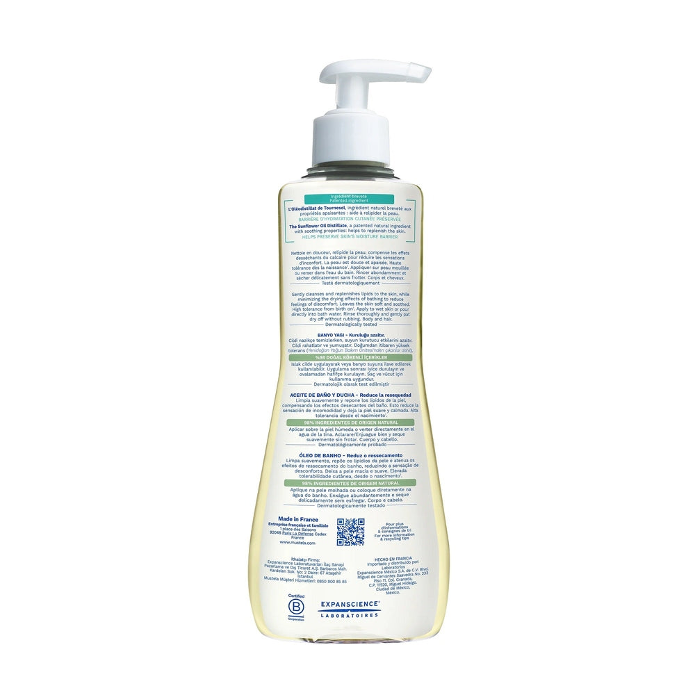 Mustela Stelatopia Cleansing Oil bottle with white pump, 500 ml, organic sunflower formula for babies