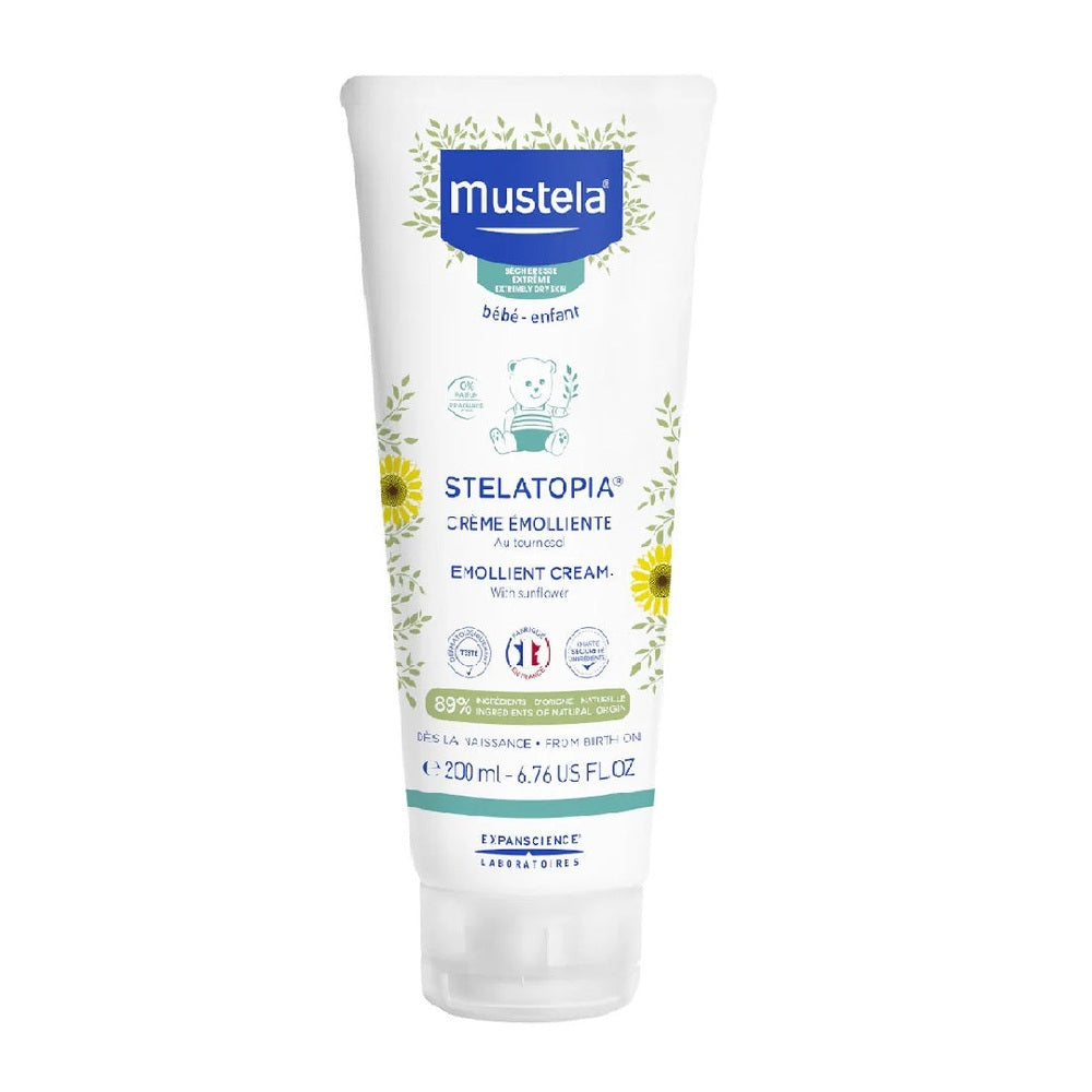 Mustela Stelatopia Emollient Cream for baby, 200 ml tube with blue logo and green floral design