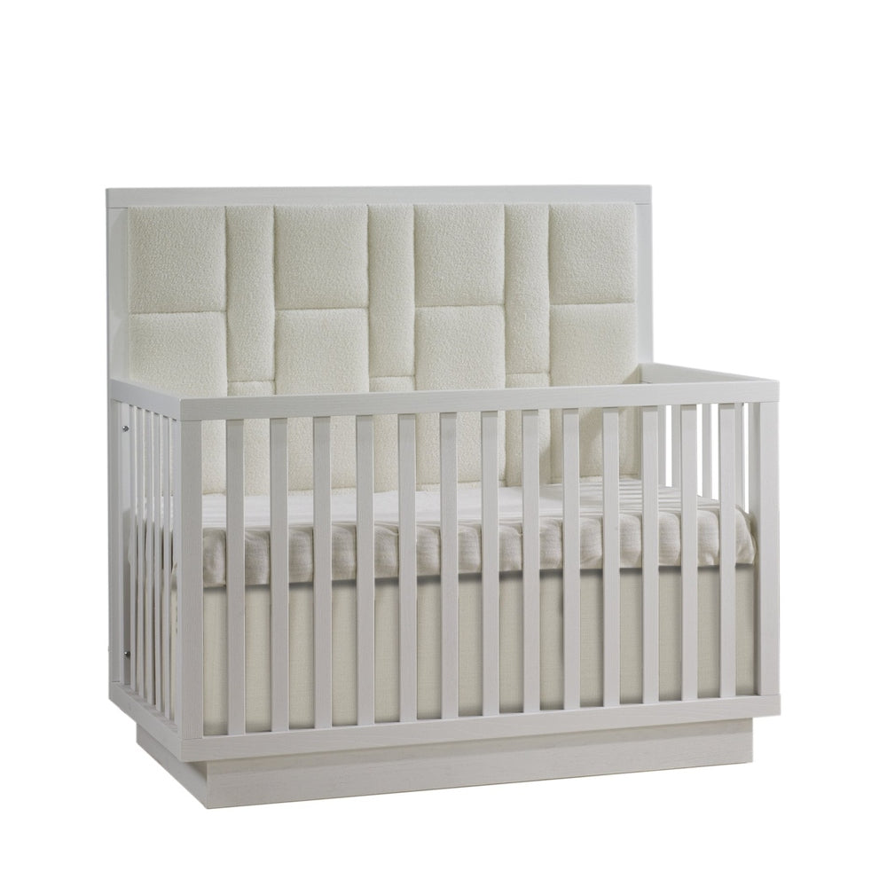 Natart Como 4-in-1 convertible crib with geometric upholstered panel in white finish