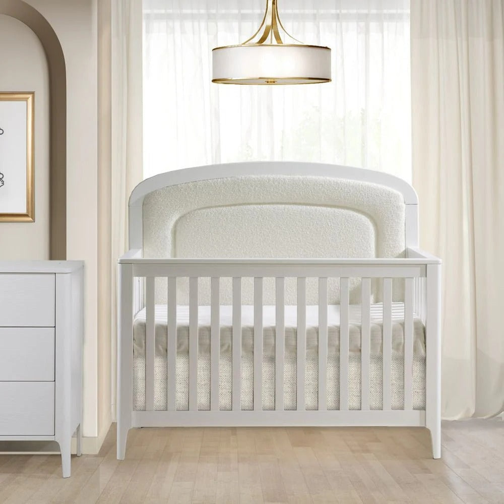 Natart Palo 5-in-1 convertible crib with an upholstered panel in white finish, NATART