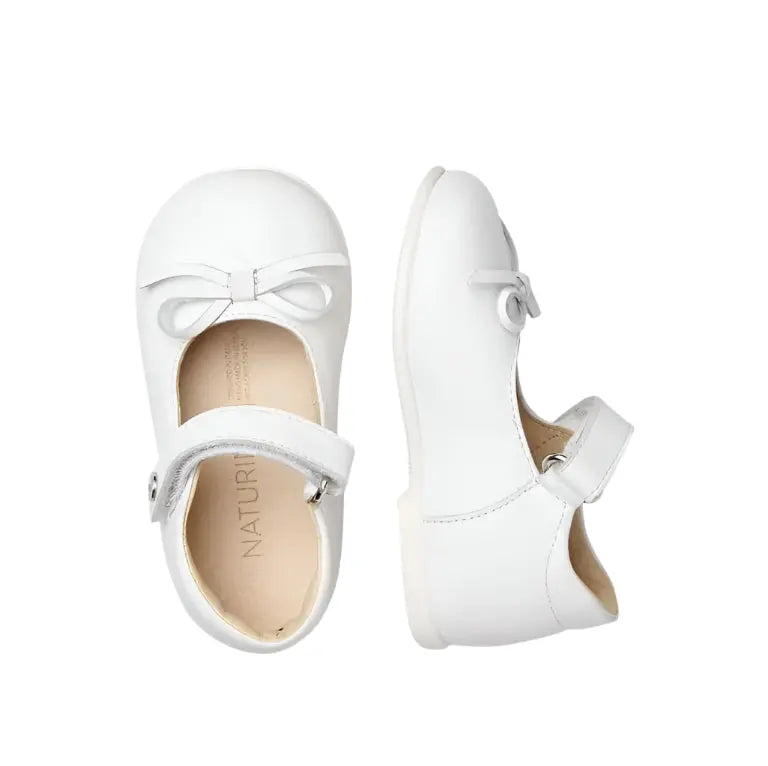 Naturino Ballet Leather Ballerinas With Bow White toddler shoes; white leather pair with ankle strap fastened and bow accent.