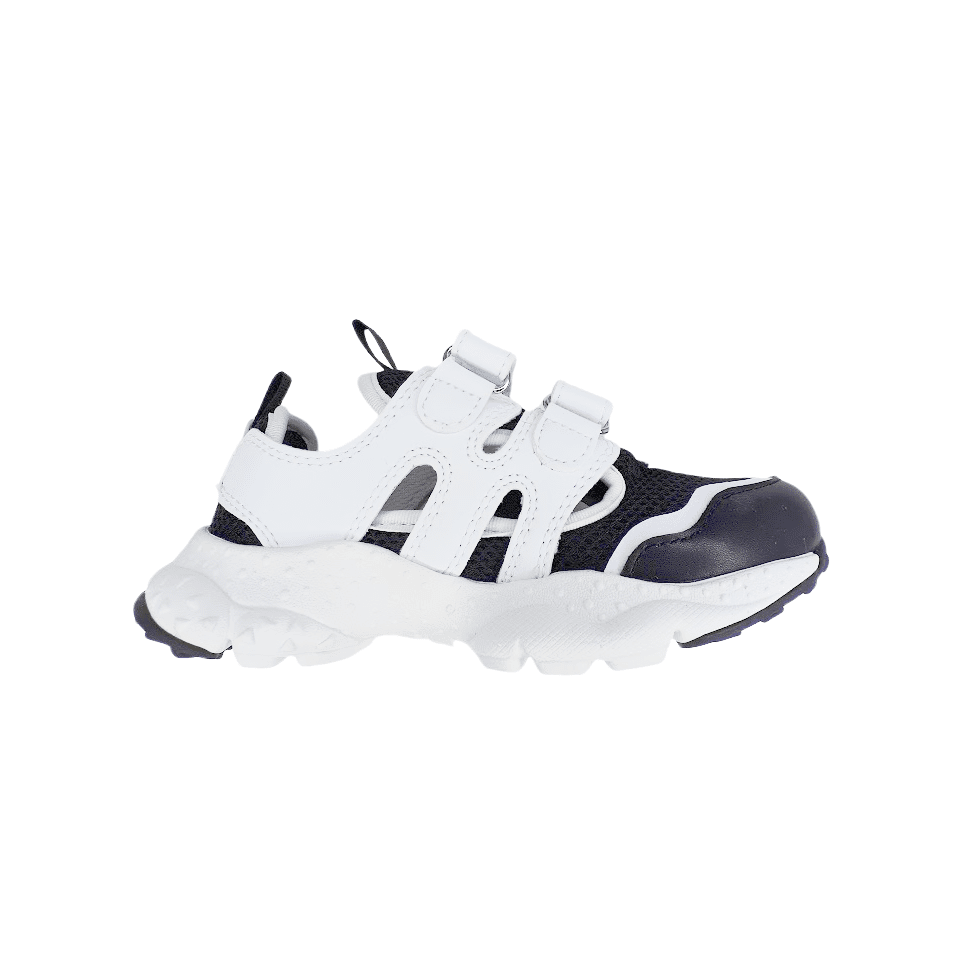 Naturino Goro Junior black-white toddler sandal with white Velcro straps and rugged sole, side view.