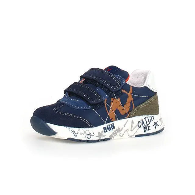 Naturino Jesko Vl Celeste Navy toddler sneakers with navy uppers, white sole, two Velcro straps fastened.