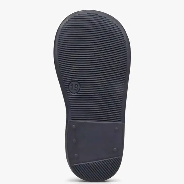 Naturino Jete patent leather ballerinas in black, bottom sole view shows textured grip pattern.