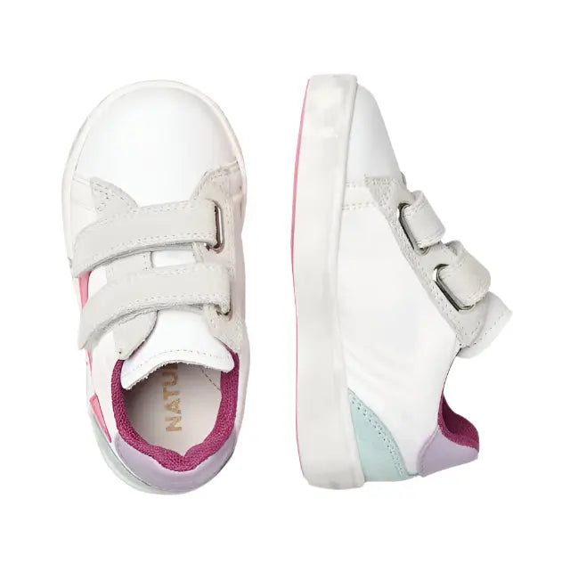 Naturino Kristil Vl White Pink toddler sneakers with Velcro straps fastened, white upper with pink accents