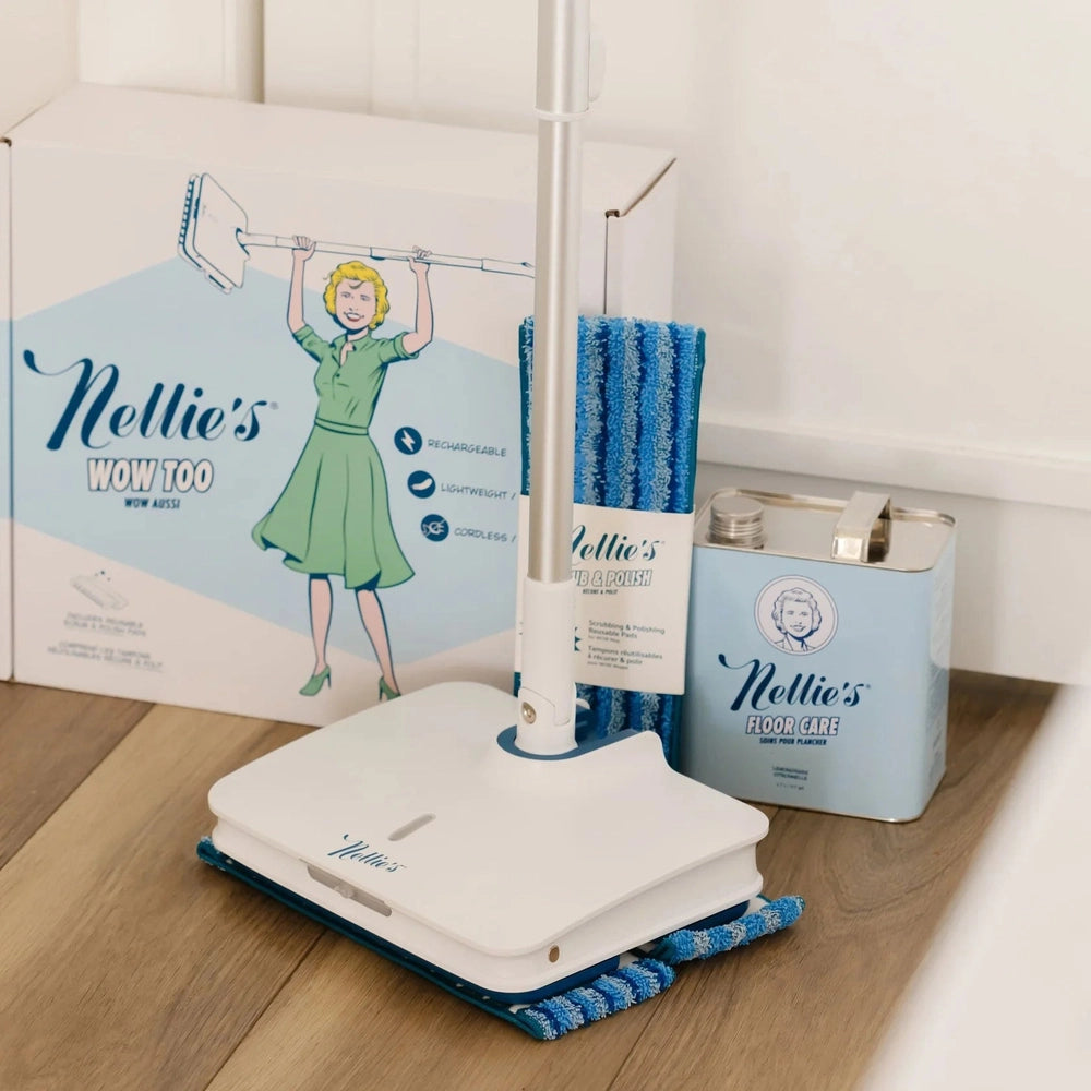 Nellie's Wow Mop Scrubbing & Polishing Pads set with blue microfiber pads, refill bundle, and Floor Care tin