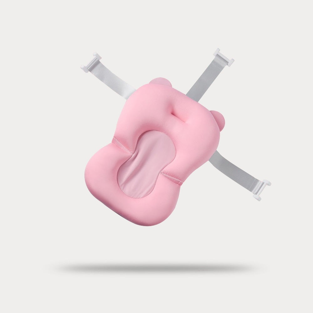 Nemibaby infant bathtub cushion pink with white adjustable straps for tub support.