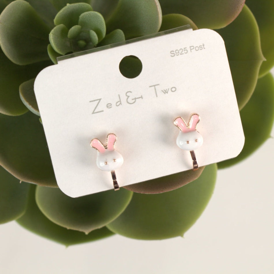 Nemibaby Earrings: white bunny heads with pink ears on rose-gold S925 posts, shown on a display card.