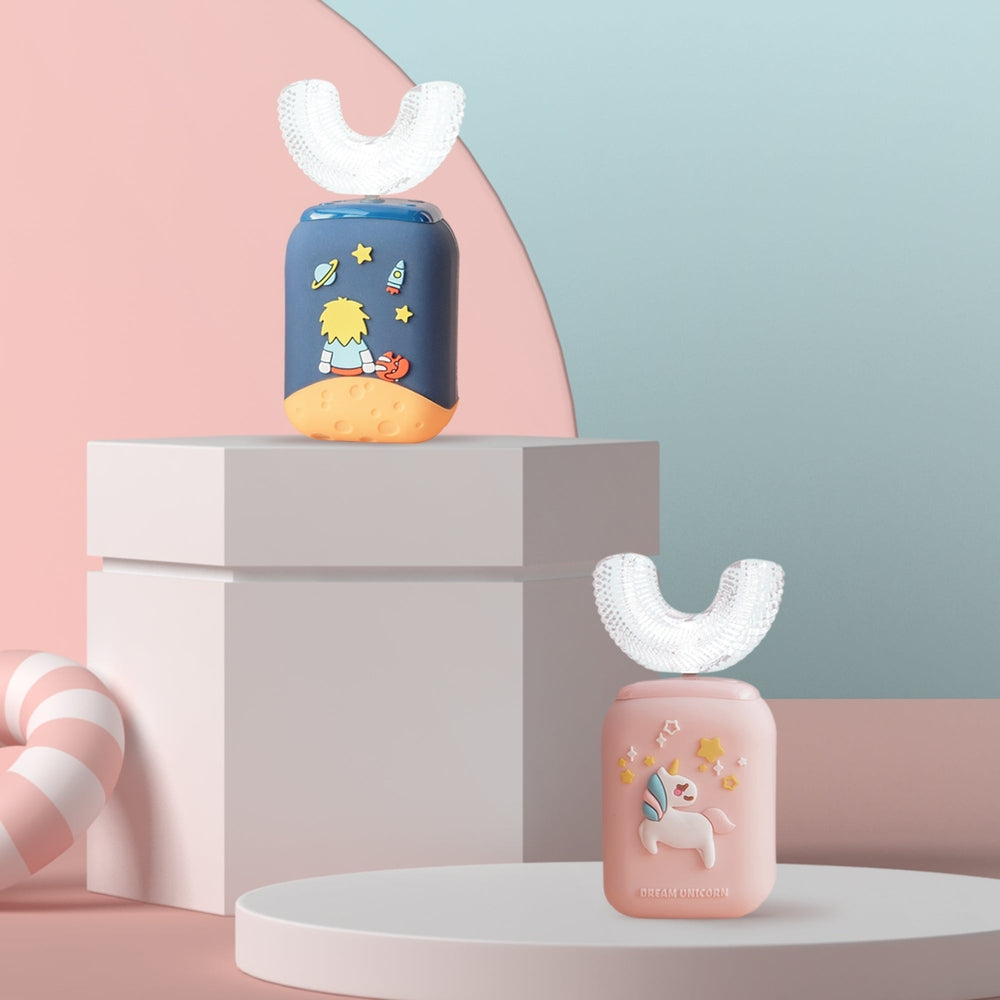 Nemibaby Kids U-Shape Toothbrush Pink with clear U-bristle guard, unicorn-themed packaging.