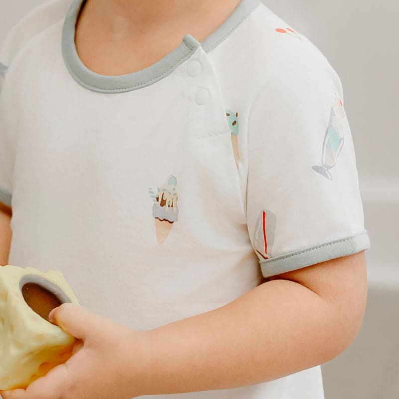 Nest Designs Avocado Bamboo Short Sleeve Play Set Ice Cream Summer; baby in white bodysuit with pastel ice cream prints