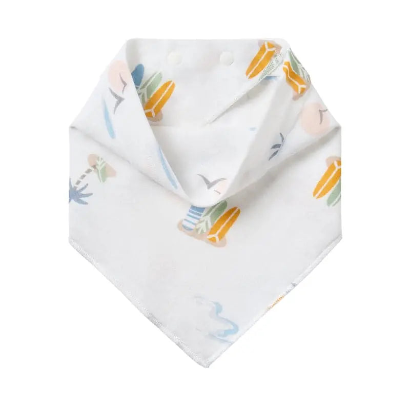 Nest Designs bamboo baby bandana bib, white with colorful print, folded into triangle for ages 3–24 months.